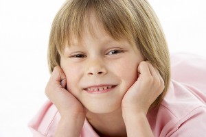 Studio Portrait of Smiling Boy